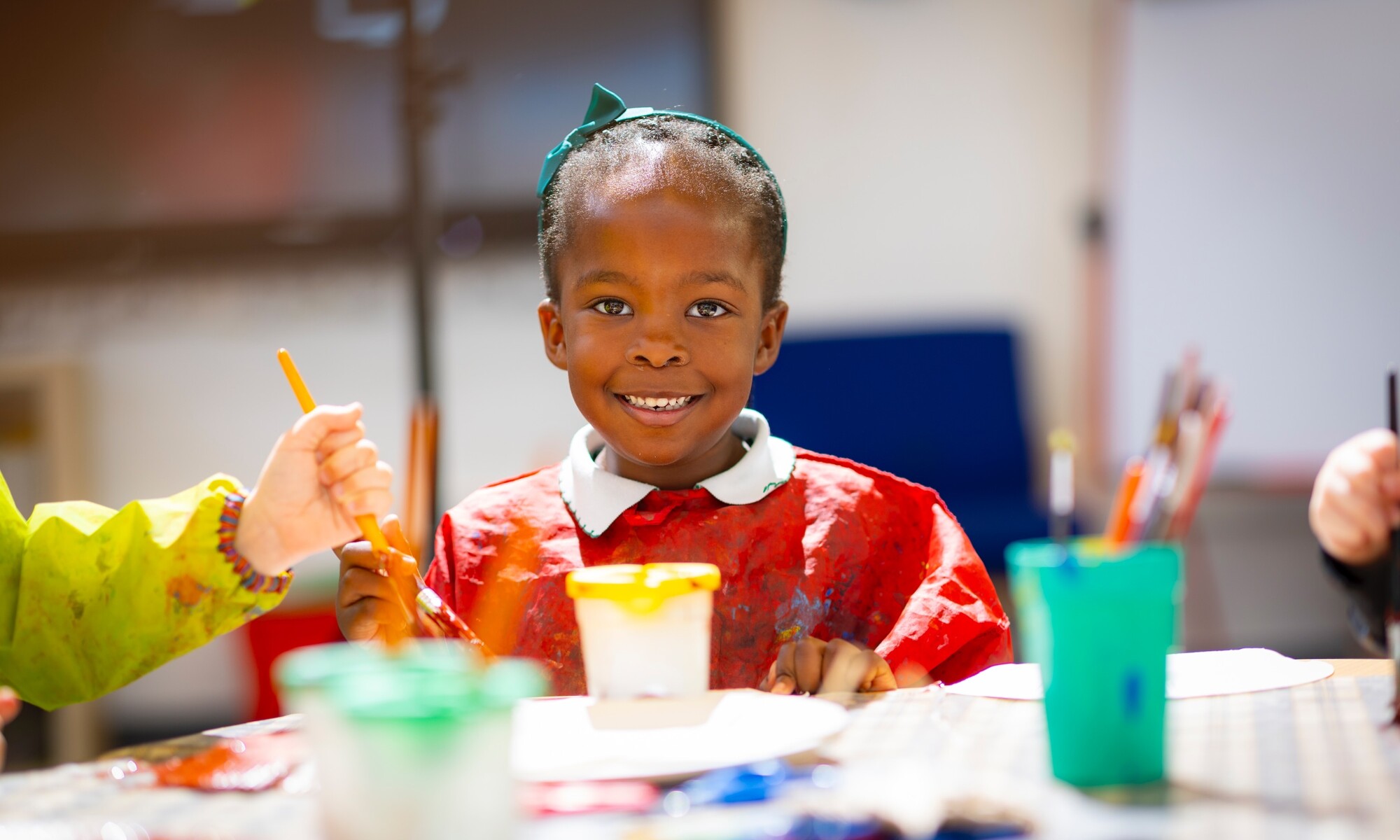 Telscombe Cliffs Academy Image of Pupil Painting in the Classroom - 129 of 139